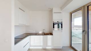 Recent appartement met royaal zuidgericht terras en zicht op de Schelde.Nieuw gebouw voldoet aan zeer strenge energiezuinige regeling.Inkomhal met...