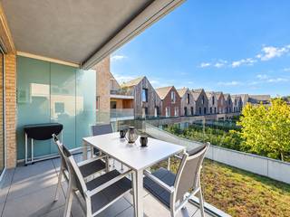 Energy-efficient BEN-APARTMENT with SOUTH-FACING TERRACE, PRIVATE PARKING SPACE, and CELLAR STORAGE, ideally located on the SCHELDE ISLAND in the HEART OF OUDENAARDE. This SUSTAINABLE and HIGH-QUALITY finished apartment is part of the recent project "THE HARBOUR BUILDING" from 2021 and combines an EXCELLENT LOCATION with MODERN LIVING COMFORT. Thanks to the EPC LABEL A, you benefit from an EXTREMELY ENERGY-EFFICIENT residence, while shops, restaurants, public transport, and other daily amenities are WITHIN WALKING DISTANCE. From the entrance hall, you will reach the guest toilet, two spacious bedrooms, a well-appointed bathroom, and the bright living area with an open kitchen. Adjacent is a practical separate laundry room, which provides extra comfort for daily use. The SOUTH-FACING TERRACE is the perfect spot to quietly enjoy the sun. Moreover, a PRIVATE PARKING SPACE and CELLAR STORAGE are included in the price.<br /><br />Address: Castel Madamastraat 4 bus 201 in Oudenaarde<br /><br />EPC: 23kWh/m², G-score and P-score A, No renovation obligation, administrative measures in the measures register: No