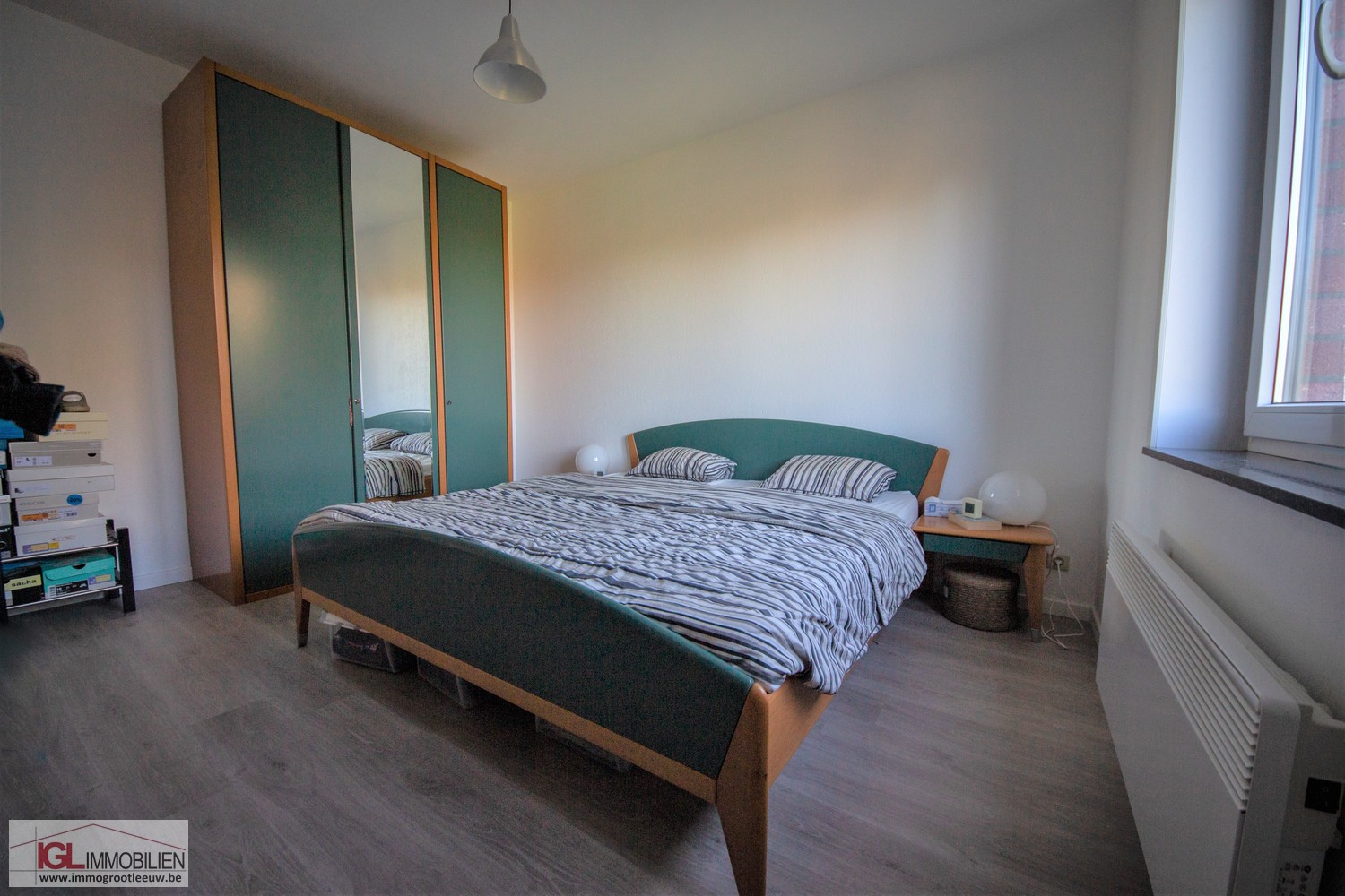 Appartement spacieux au rez-de-chaussée avec 2 chambres à coucher et garage fermé - photo 4