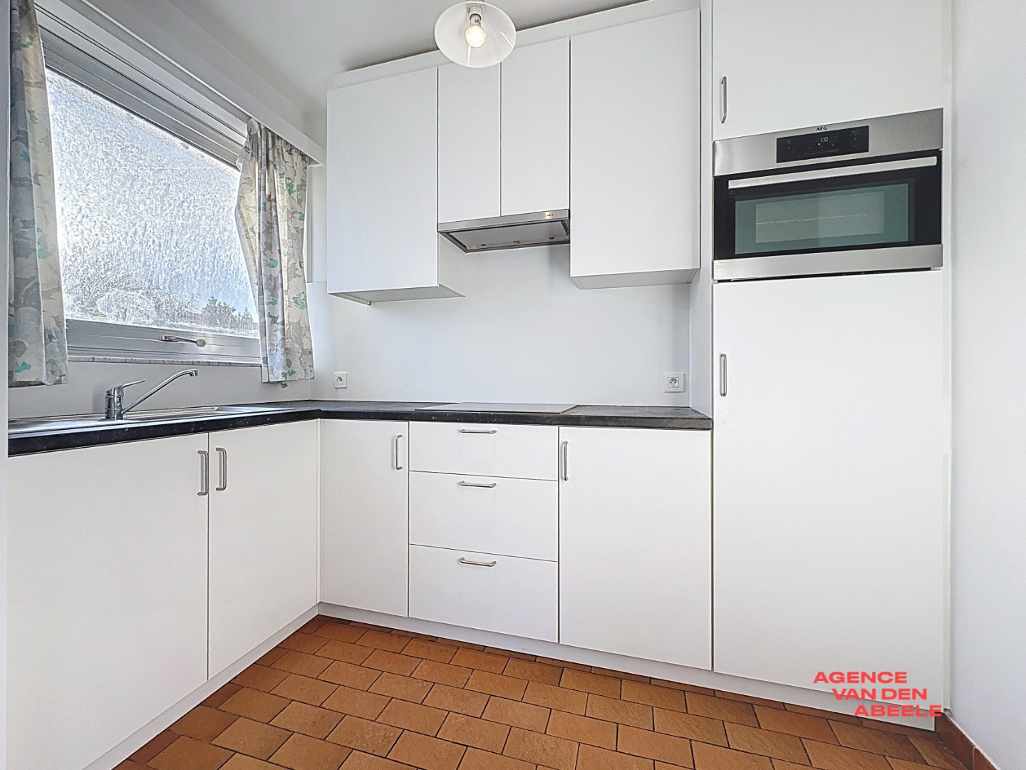 Vernieuwd gelijkvloersappartment - foto 5