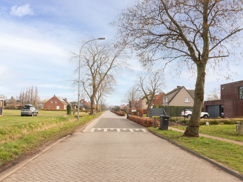 Ruime bouwgrond in groene en rustige buurt - foto 4