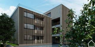 Appartement met 2 slaapkamers met zeer ruim terras (98 m²) gelegen op de derde verdieping: Inkom met gastentoilet en ruimte voor vestiaire...