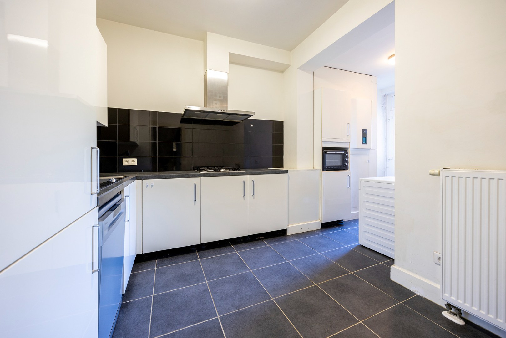 Gelijkvloers appartement met 1 slaapkamer en tuin - foto 4