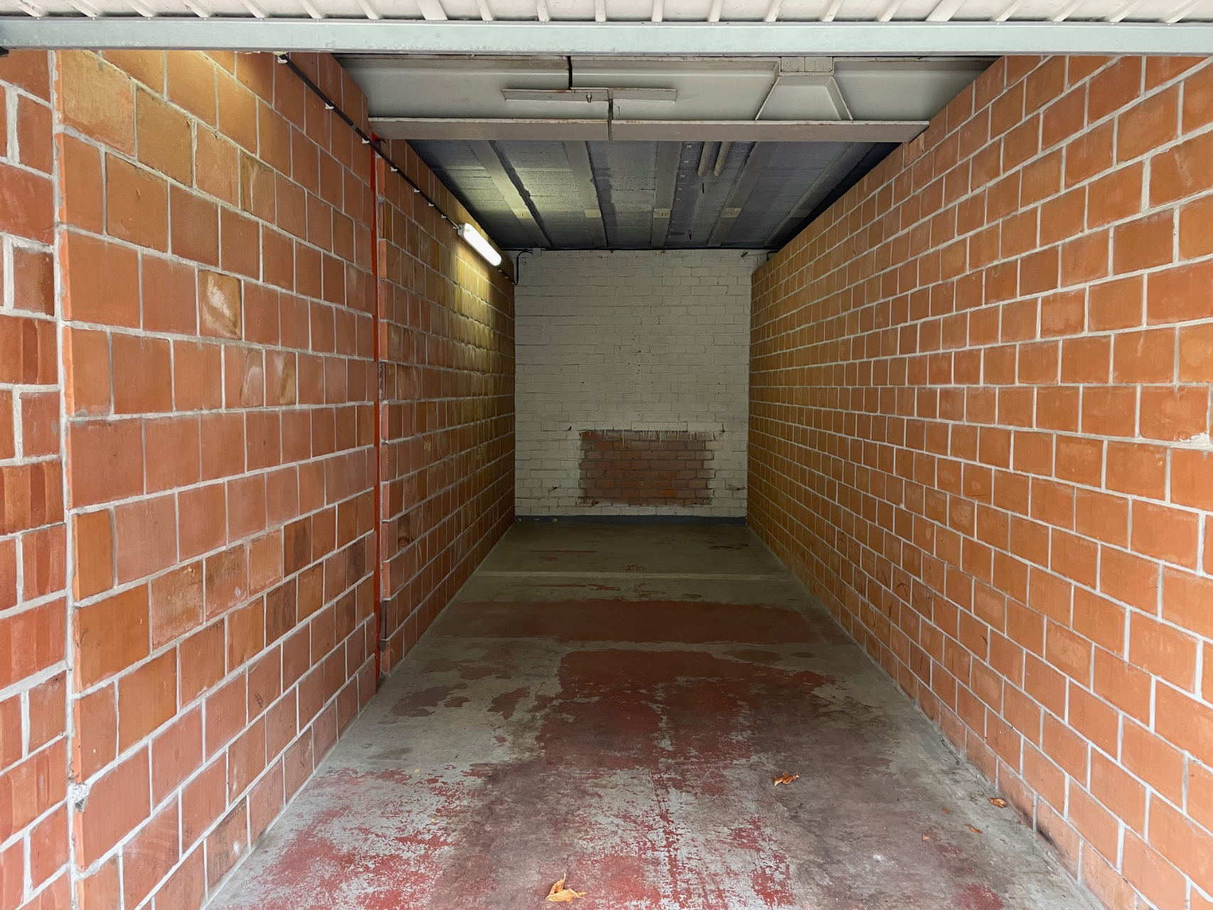 Dubbele garagebox op een afgesloten terrein vlakbij de Grote Markt! - foto 3