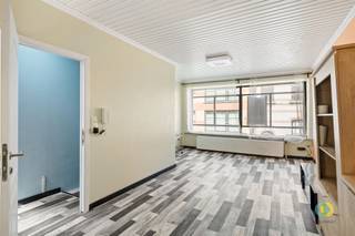 <p><span>Located in the heart of Vilvoorde, this characterful home is currently arranged for mixed use, but lends itself perfectly to be converted into a spacious and comfortable single-family home. On the second floor there is a generous bedroom with adjoining dressing room and a first bathroom. From the dressing room you have direct access to a pleasant roof terrace, an ideal place to unwind in the middle of the city. The second floor offers a bright living space with open kitchen, perfect for cozy evenings with family or friends. You will also find a second bathroom here, providing additional comfort. The attic floor is furnished as a second bedroom and forms a cozy, private space. On the ground floor, you will currently find another commercial space with a separate office area. This can easily be integrated into the house and set up as, for example, an additional living space, hobby room or home office. From the office space you have access to a separate toilet and to the courtyard. The basement provides practical storage space and houses the high-quality heating system. Although there is still work to be done on the property, this offers you the opportunity to furnish the property completely to your own taste, creating a real home with added value. Thanks to its central location and many layout possibilities, this is a unique opportunity for those looking for a property with potential in the center of Vilvoorde.</span></p><p><span> </span></p>