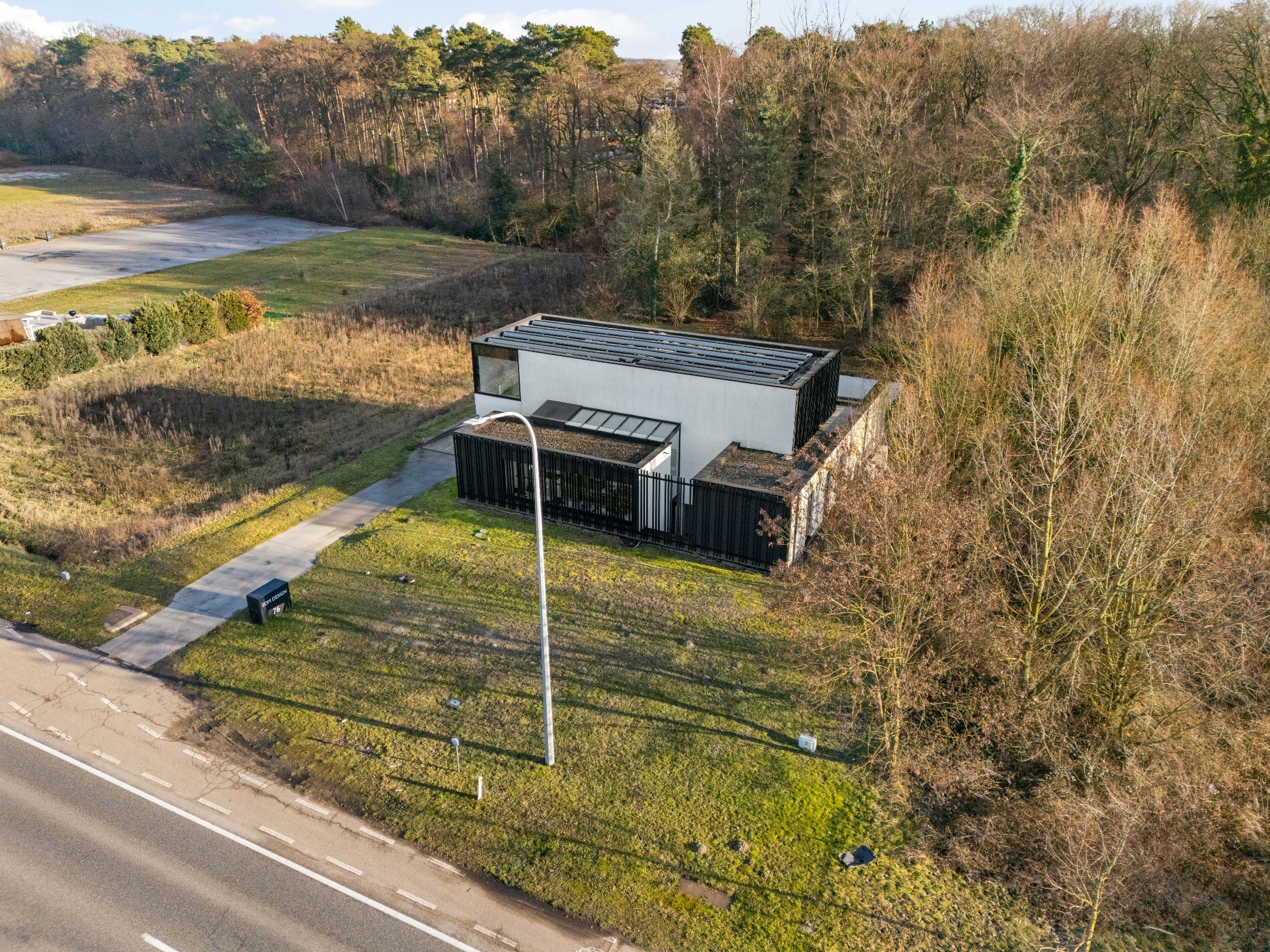 Bâtiment éco-énergétique avec 2 appartements, espace commercial et places de parking souterraines à Diepenbeek - photo 5