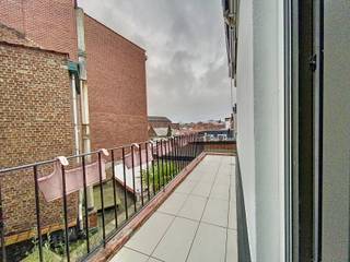 Lichtrijk appartement in het hartje van Tienen.Dit appartement ligt in een zeer rustig gebouw op het 2de verdiep. Bij het binnenkomen valt de...
