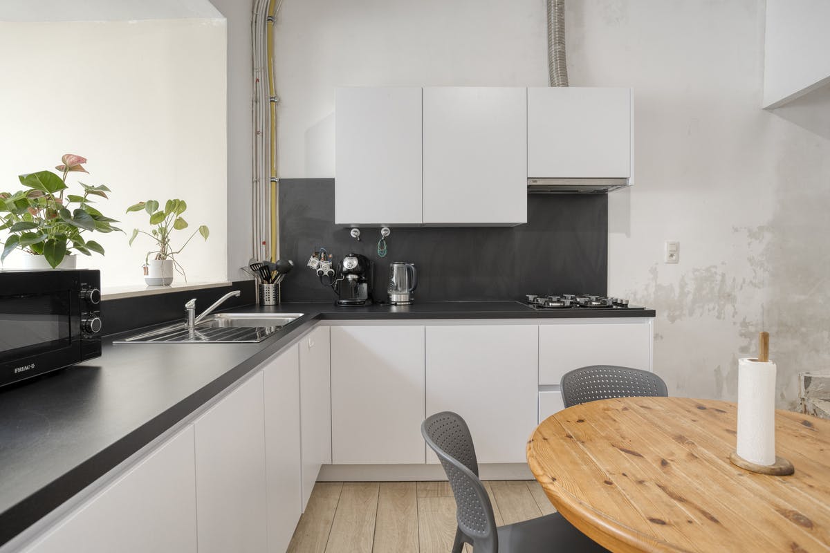 Gezellige stadswoning met tuin en 4 slaapkamers in Mechelen - foto 4