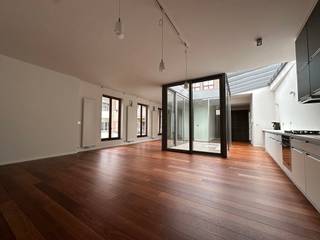 Unique city loft with an inner patio in the historic centre<br /><br />This modern loft offers a unique layout with a spacious inner patio as its central feature. The patio not only creates a cozy atmosphere but also provides ample space to enjoy a summer barbecue with friends or family.<br /><br />Around the patio, you can set up a spacious living room, dining area, and a handy office nook—perfect for both relaxation and working from home. The spacious, practically designed kitchen is equipped with all modern conveniences and even has room for a washing machine.<br /><br />Additionally, you’ll find a sleeping area (not enclosed) with built-in wardrobe, offering extra comfort and storage space. The loft features a stylish bathroom with a walk-in shower and a separate toilet.<br /><br />The monthly service charges are only €105, a fixed amount covering water usage, maintenance, and electricity for the common areas.<br /><br />Location:<br />This loft is perfectly situated in the vibrant city center, just a stone’s throw from the iconic Stadswaag. Enjoy all the amenities, shops, and dining options the city has to offer, right on your doorstep!<br />Location:<br /><br />This loft is perfectly situated in the vibrant city center, just a stone’s throw from the iconic Stadswaag. Enjoy all the amenities, shops, and dining options the city has to offer, right on your doorstep!