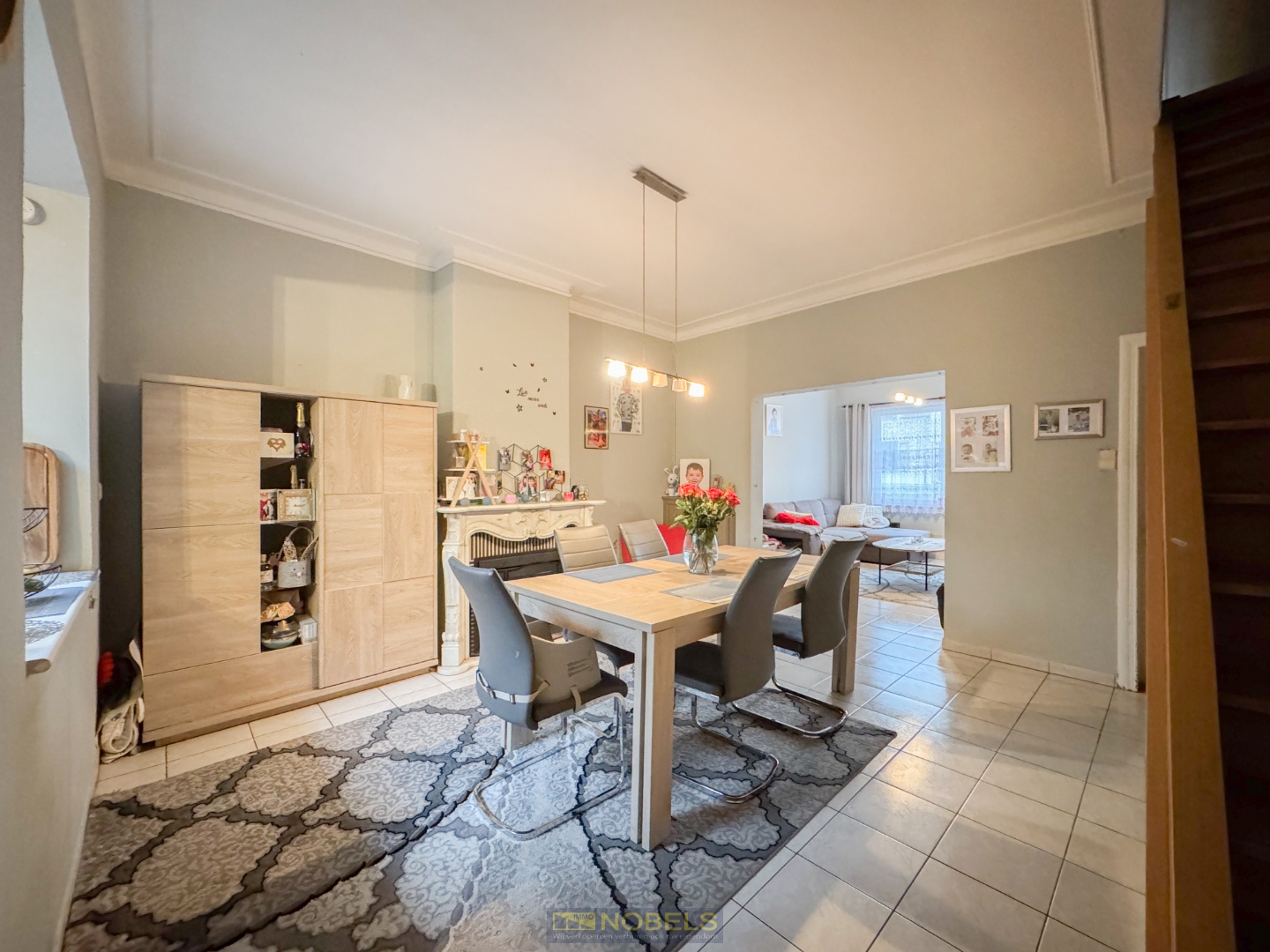 Te koop, Te moderniseren gezinswoning met diepe tuin en garage te Welden! - photo 2