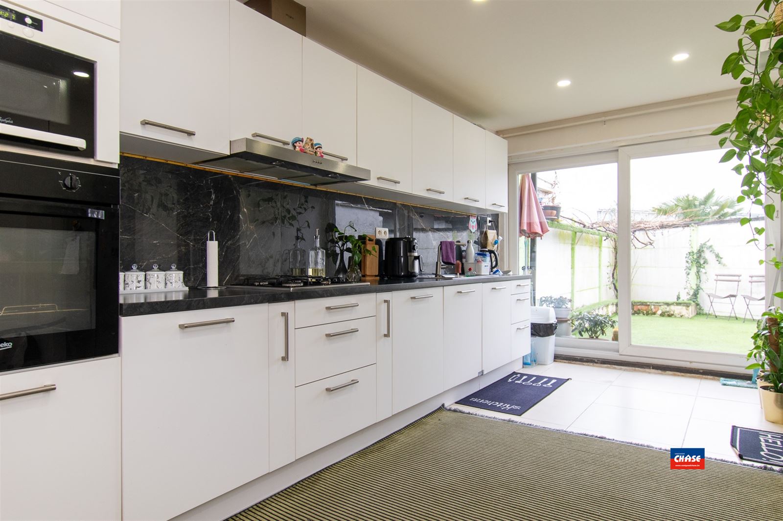 Rijwoning met 2 slpks en tuin  - foto 5