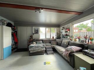Instapklare gelijkvloerse woning met zuidgerichte tuin, laadpaal en moderne voorzieningenWe betreden deze gezellige gelijkvloerse woning via de...