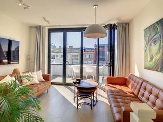 Dit gezellige duplex-penthouse appartement met terras op de 4de en 5de verdieping bevindt zich op absolute toplocatie op het Eilandje nabij het MAS...