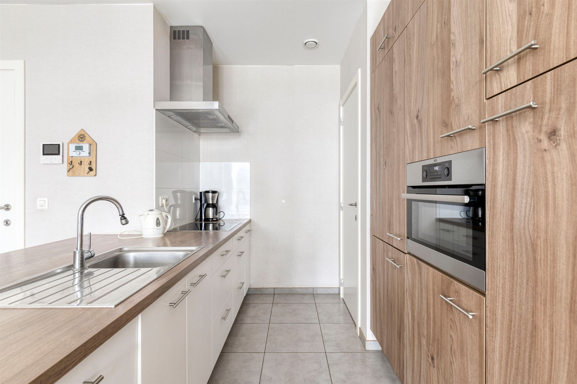 Ruim gelijkvloers appartement van 104 m² met tuin en 3 slpk! - foto 5