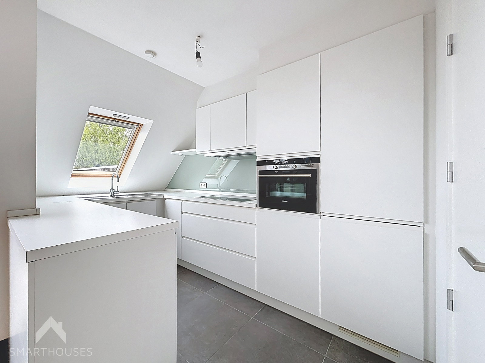 Ruim dakappartement met 2 slaapkamers en zonnig terras - foto 5