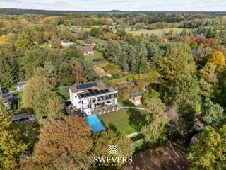 Interesse? Meer informatie op www.SWEVERS.be. - Deze exclusieve villa in Heusden-Zolder ligt in een rustig, doodlopend straatje in een...