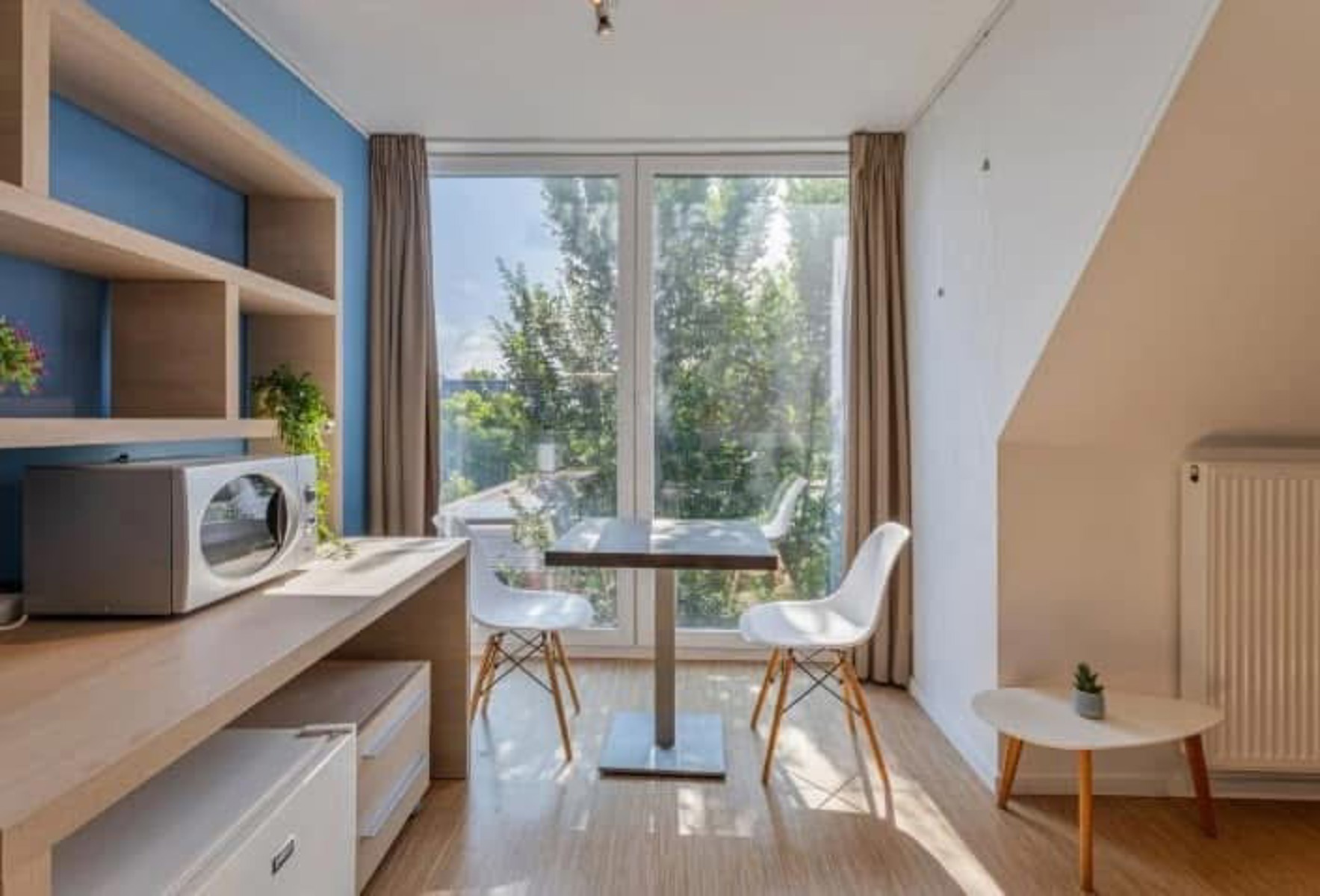 Prachtige studio met aparte slaapkamer en badkamer - foto 2