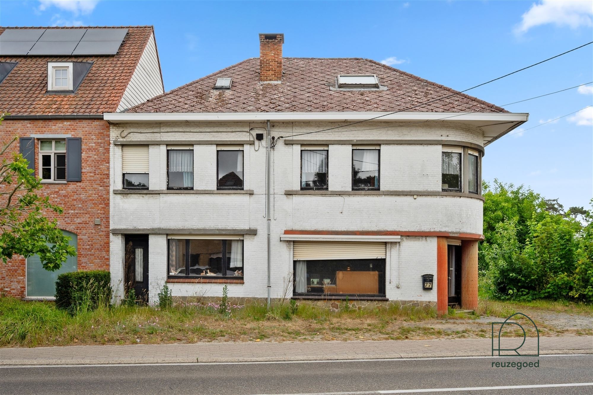 Te renoveren huis (tweewoonst) met mogelijkheid tot 2 bouwgronden - foto 1