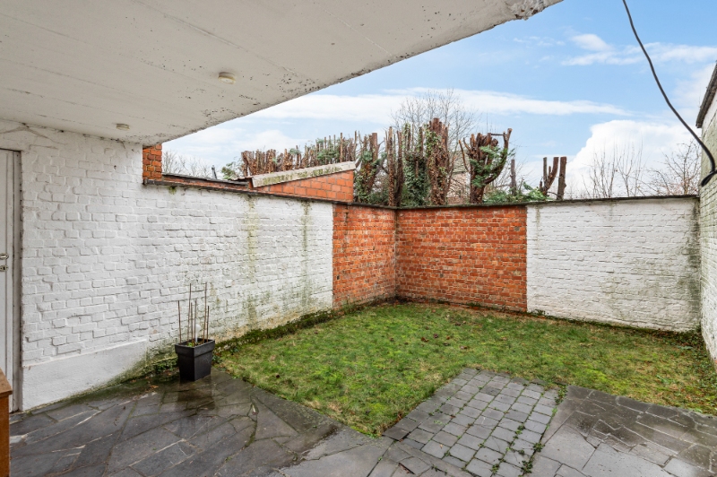 Centraal gelegen rijwoning met 2 SLK, garage en stadstuin - foto 3