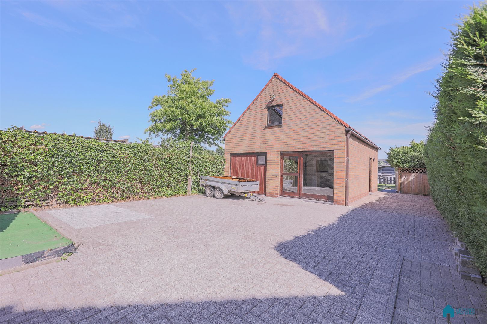 Handelsruimte met ruime woonst, aparte garage met tuin - foto 4
