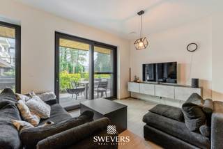 Interesse? Meer informatie op www.SWEVERS.be. - Dit modern en energiezuinig gelijkvloers appartement bevindt zich in de gezellige dorpskern...