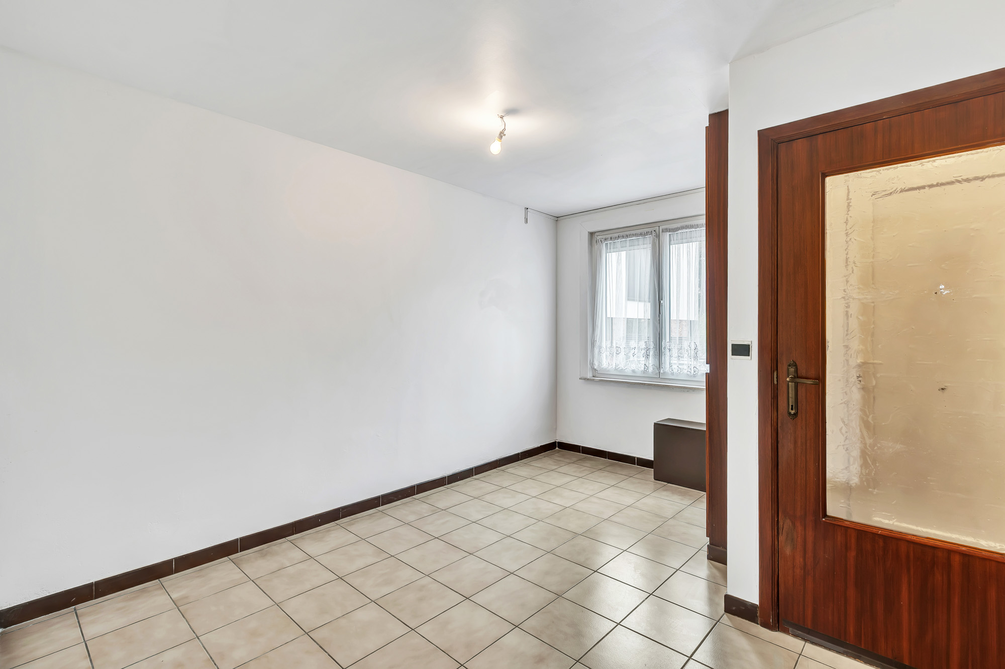 Goed onderhouden ruime rijwoning met tuin - foto 4