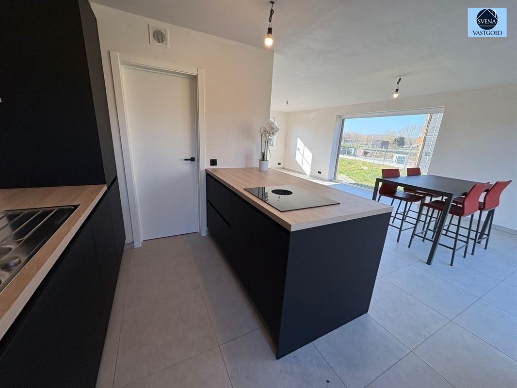  HALFOPEN NIEUWBOUWWONING MET 3 SLAAPKAMERS EN TUIN - foto 5