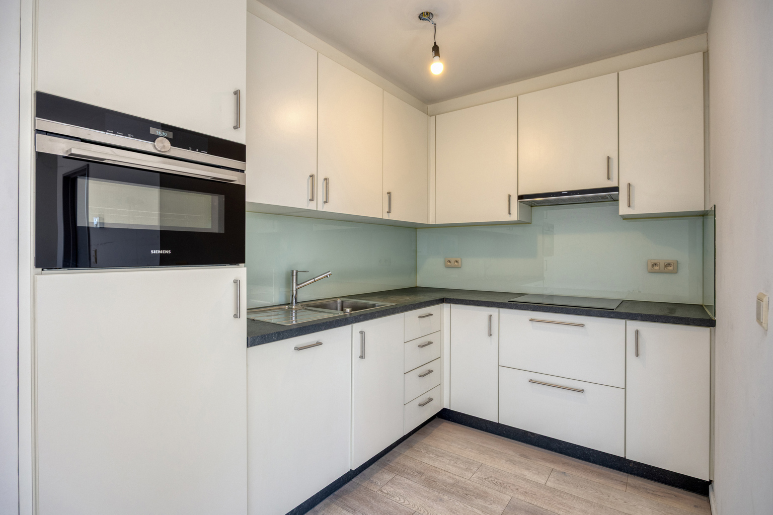 Centraal gelegen appartement met staanplaats - foto 5