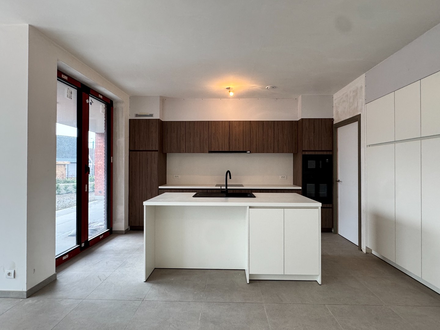 Nieuwbouwappartement met twee slaapkamers, tuin en ondergrondse autostaanplaats te koop in Zulte - foto 3