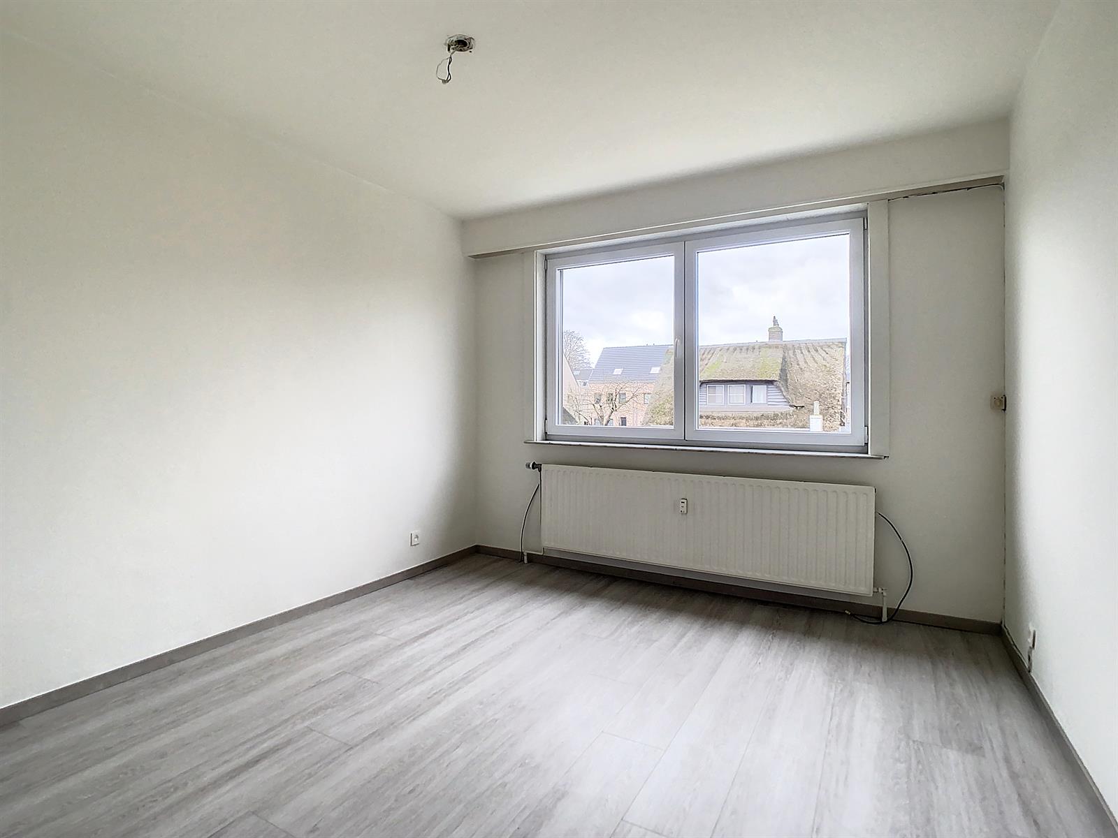 Appartement met (gedeelde) tuin in rustige straat - foto 4