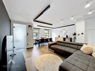 Instapklare woning in een doodlopend straatje bestaande uit een inkomhal met vestiaire, gezellige leefruimte met eet-en zithoek, volledig...
