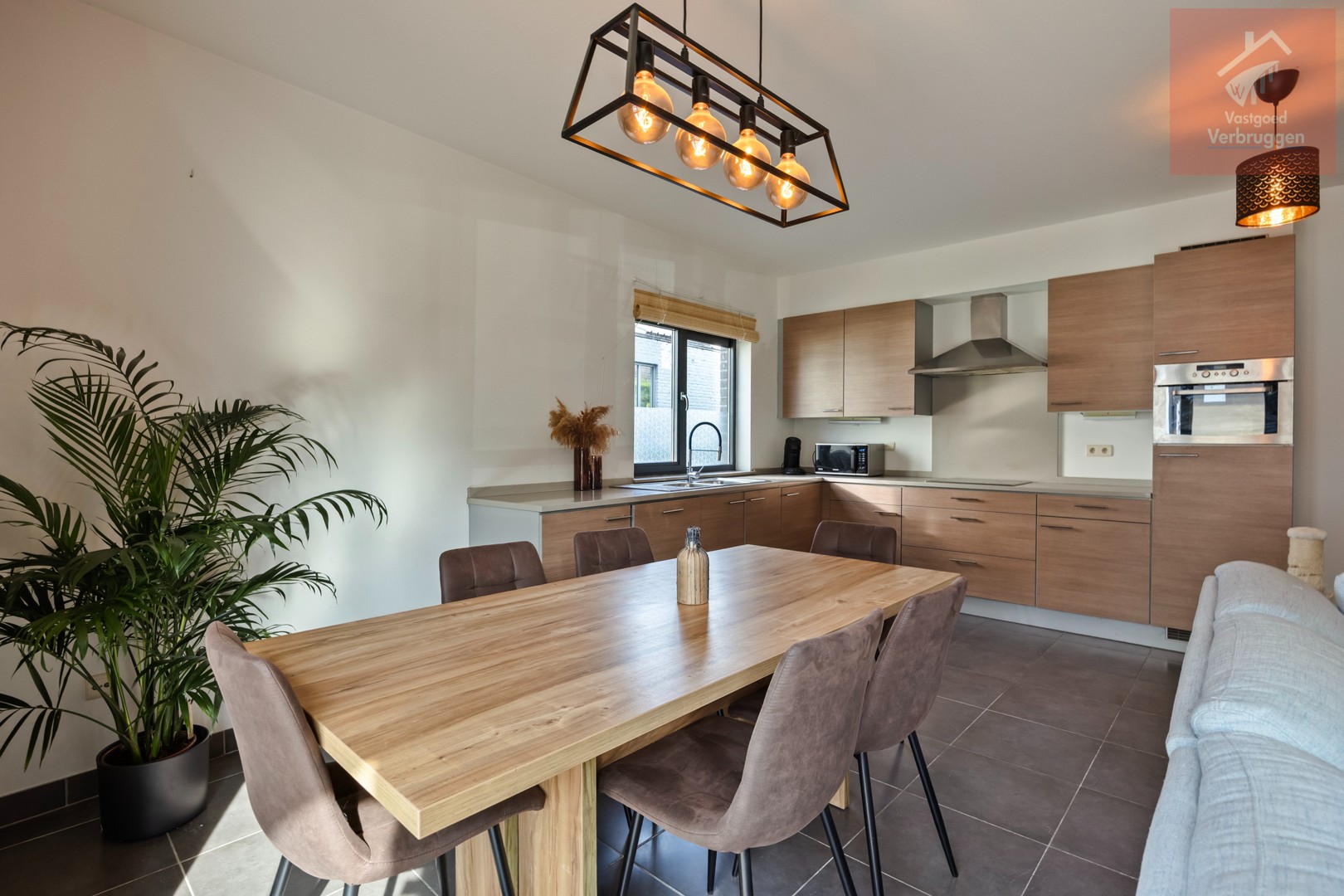 Modern instapklaar gelijkvloers appartement met 2 slpk, terrassen en autostaanplaats - foto 5