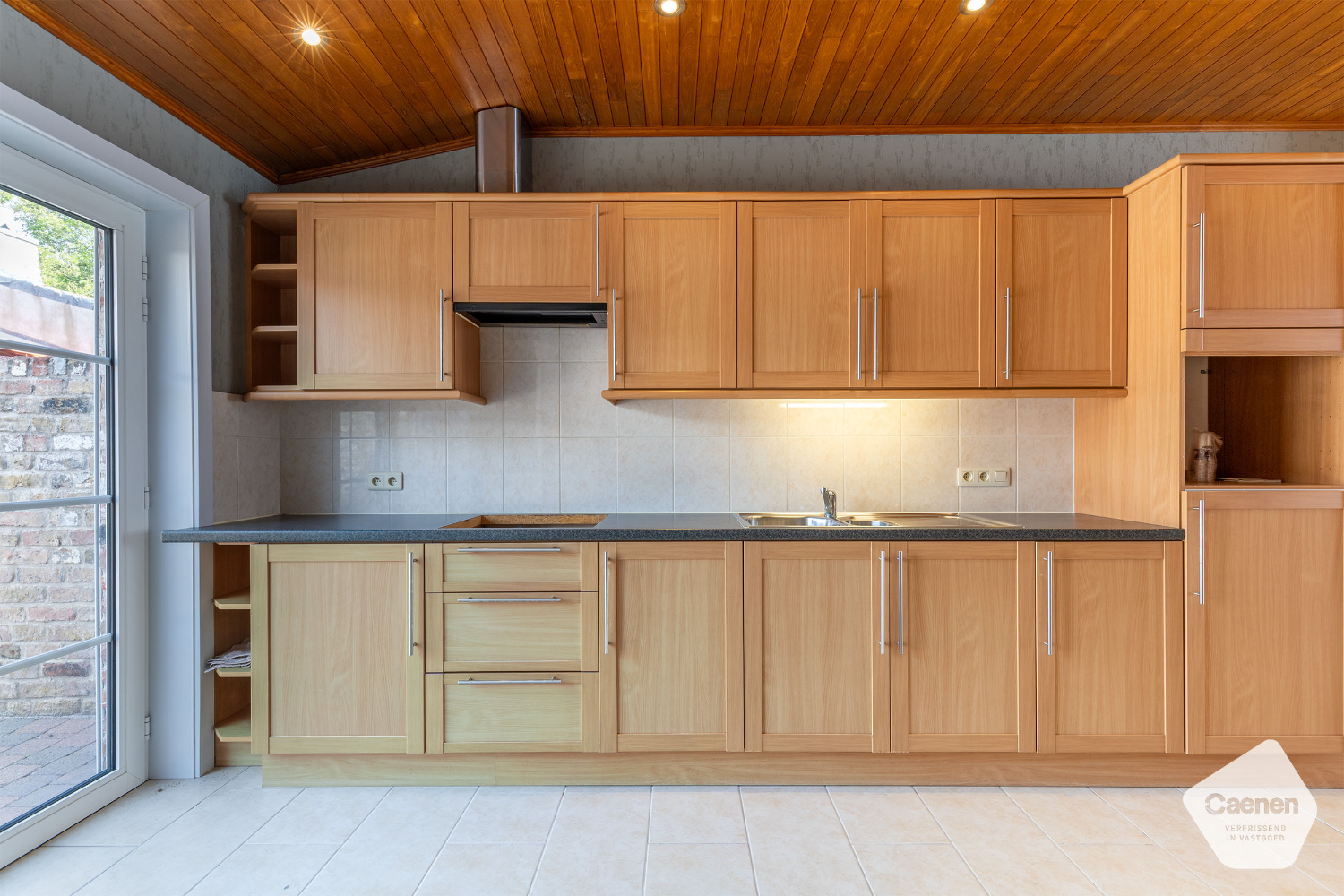 Verzorgde woning met verrassend ruime zonnige stadstuin. - foto 4