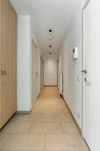 This beautiful and ready-to-move-in apartment on the first floor on the left (elevator available) combines space, natural light with large windows and a practical layout in a prime location in Maria ter Heide, Brasschaat <br /><br />Layout:<br />- Entrance hall with built-in cupboards<br />- Spacious living space (living room + kitchen) with large windows and parquet flooring<br />- Handy storage room with washer/dryer connection<br />- 2 full bedrooms (15 m², 11 m²) with built-in wardrobes and parquet flooring<br />- Separate guest toilet<br />- Bathroom with double sink and a bath with shower function <br />- 17m² terrace with closed storage space (ZO orientation)<br /><br />In addition, the apartment has a parking space in a closed garage (external) and a closed storage room.<br /><br />Details:<br />- EPC 117 kWh/m² year - (label B)<br />- Free by authentic deed<br />- Common costs: €200/month<br /><br />Interested in an on-site viewing? Do not hesitate to contact us at 03 666 66 66 - If you would like a free estimate of your property via our real estate office, please email us at brasschaat@dewaele.com<br /><br />Register of measures: no