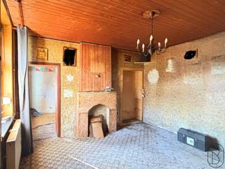 Te renoveren woning met grote tuin! VEEL POTENTIEEL.