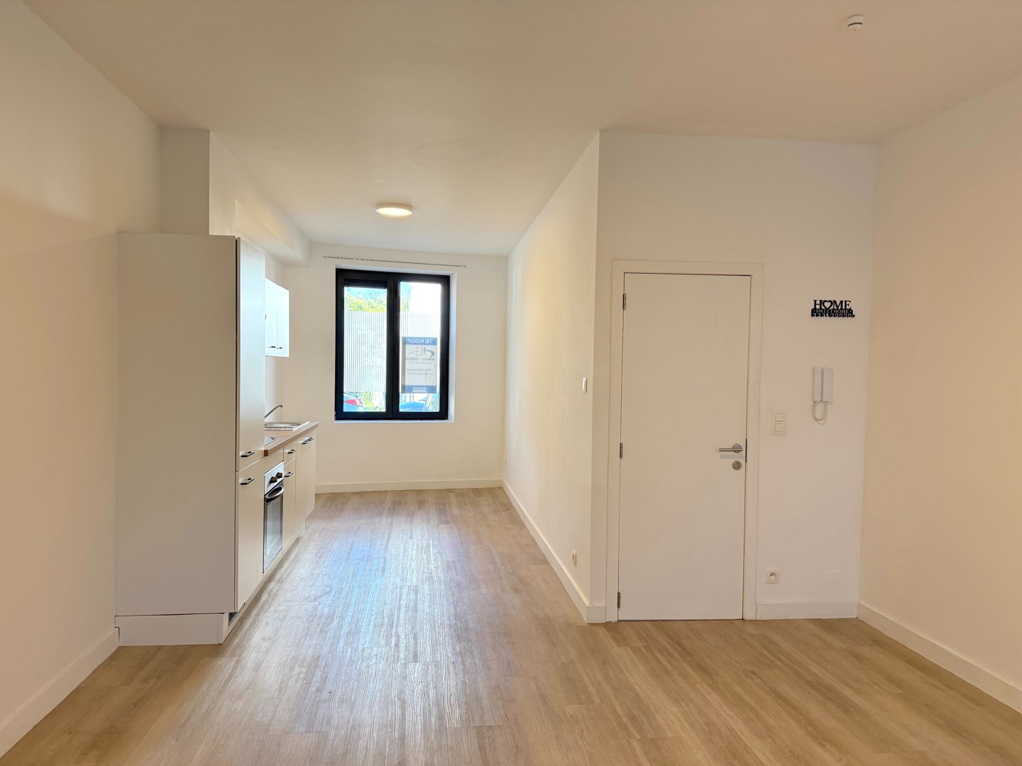 Gerenoveerd en energiezuinig gelijkvloers appartement met private koer - foto 2