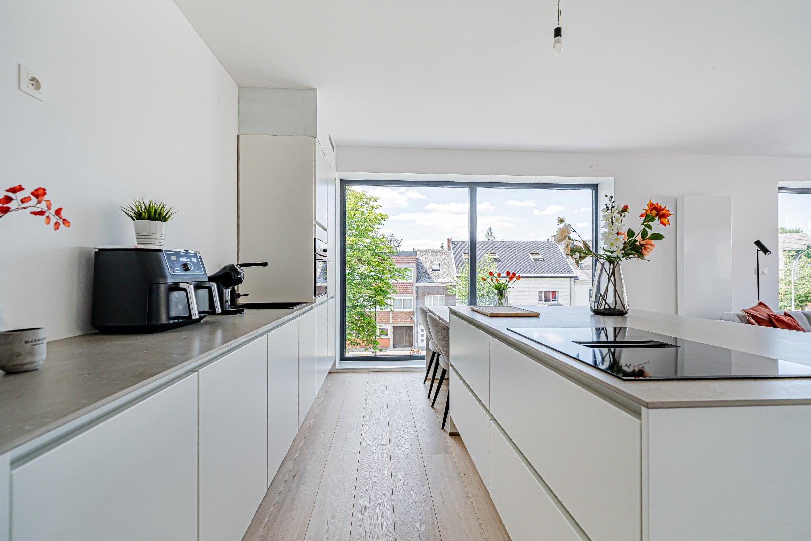 Stijlvol en energiezuinig hoekappartement met 2 slaapkamers, EPC A, terras en autostaanplaats - foto 4
