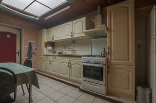 VERKOOP OP LIJFRENTE. Centraal gelegen woning met 2 slaapkamers en tuin.