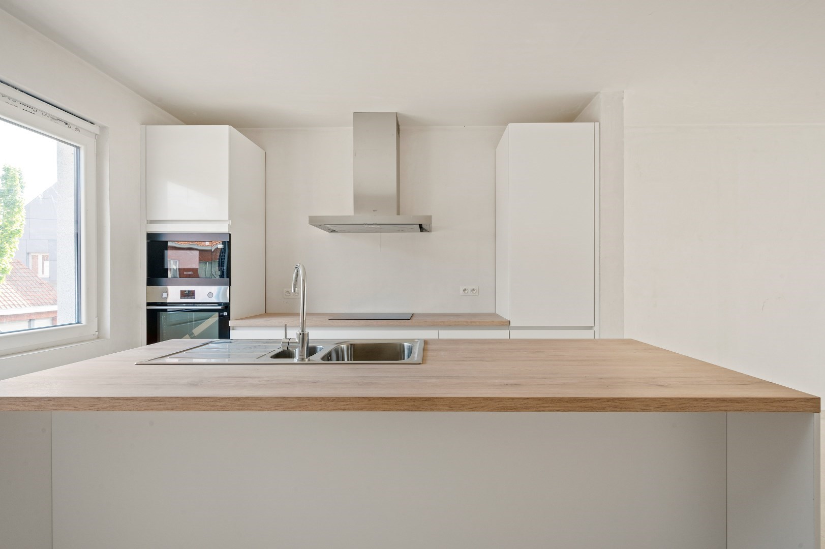 DUPLEX NIEUWBOUWAPPARTEMENT MET 2 SLPKS EN RUIM TERRAS TE GELUWE - foto 5