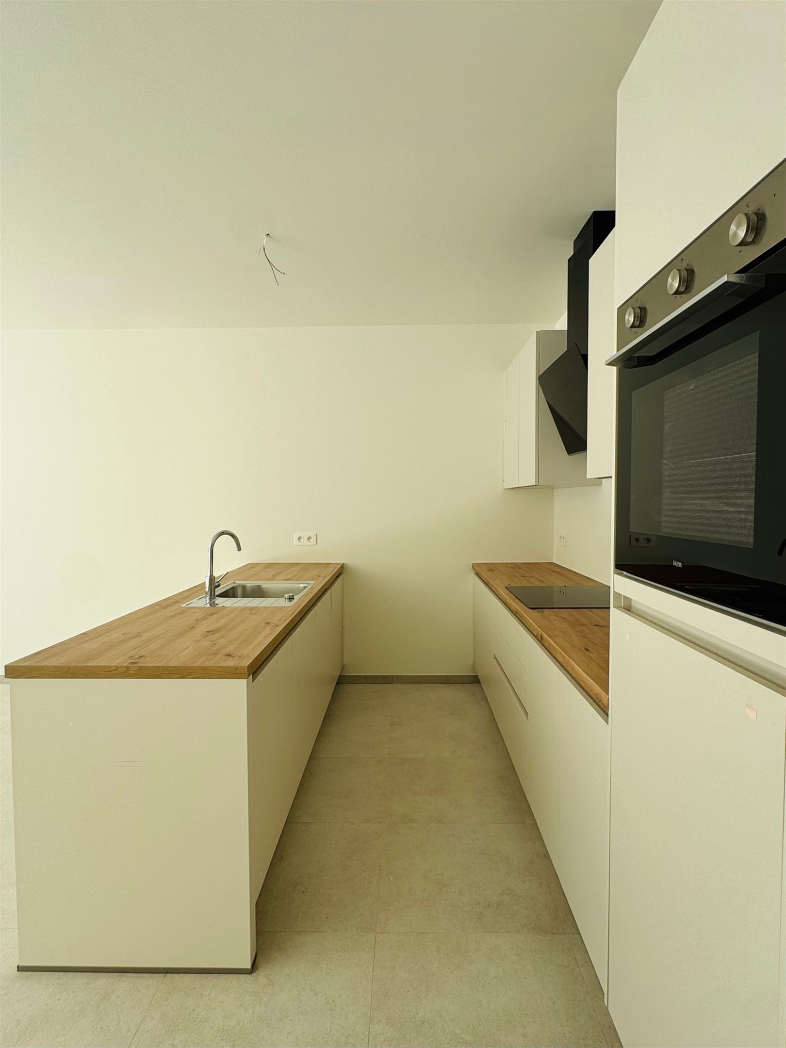 Gelijkvloers appartement met tuin, terras en autostaanplaats - foto 4