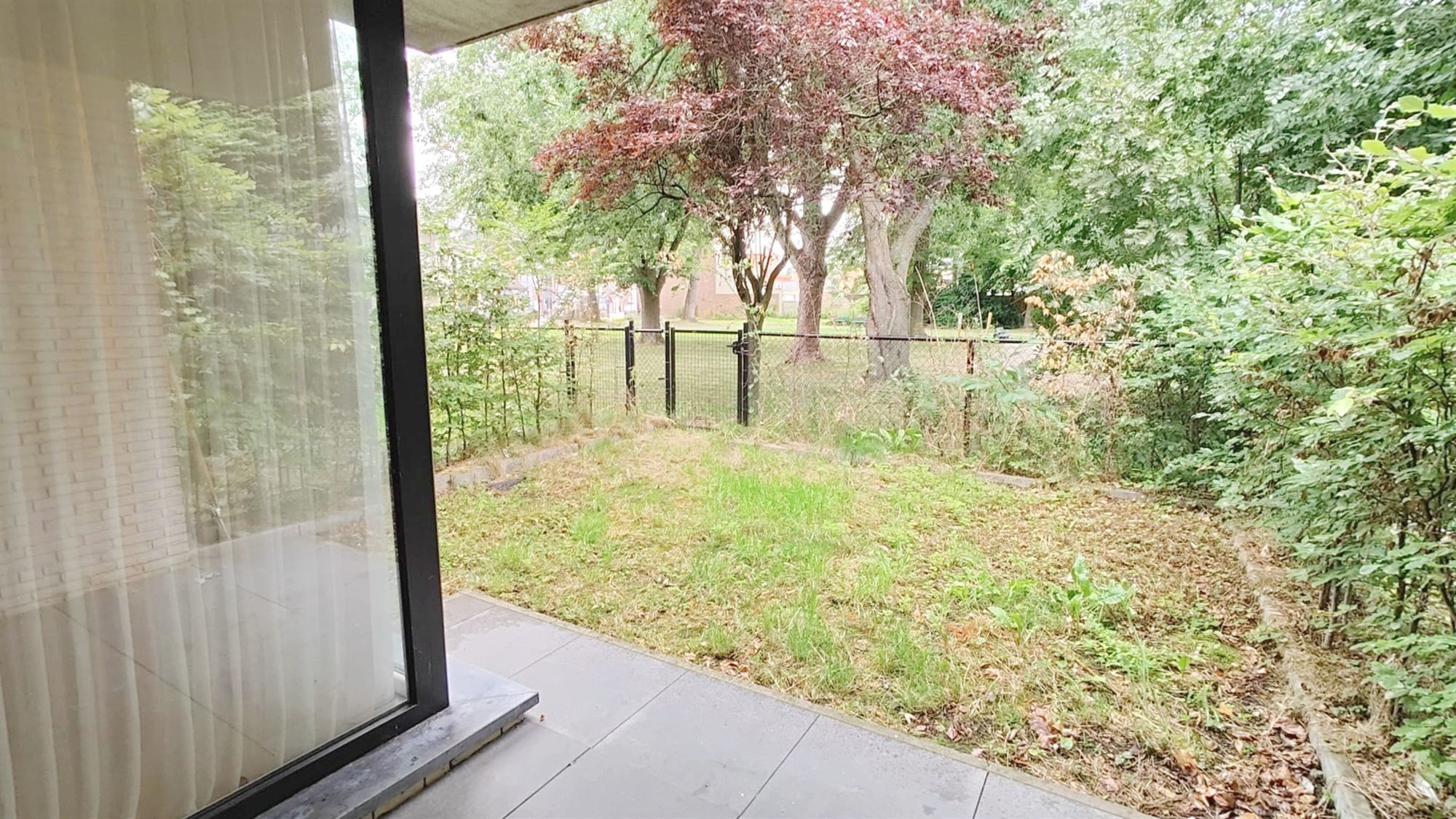 GELIJKVLOERS APPARTEMENT MET TERRAS + TUIN - foto 5