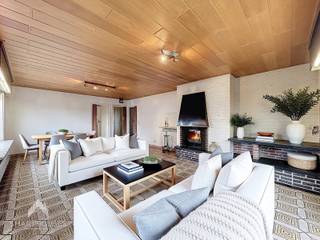 Centraal gelegen alleenstaande woning bestaande uit een inkom met bureel/polyvalente ruimte, hal met afzonderlijk toilet, lichtrijke leefruimte...