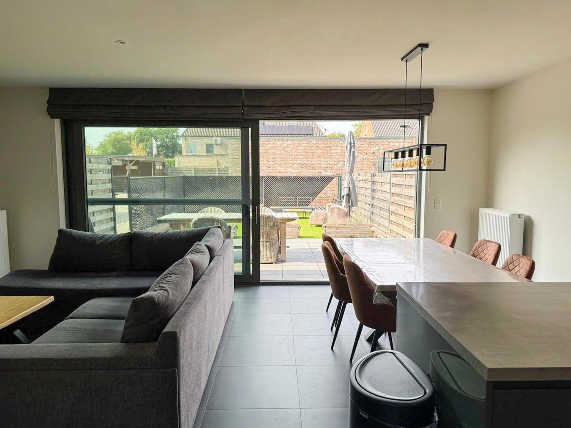 Gezellig gelijkvloers appartement met tuin en garagebox - foto 4