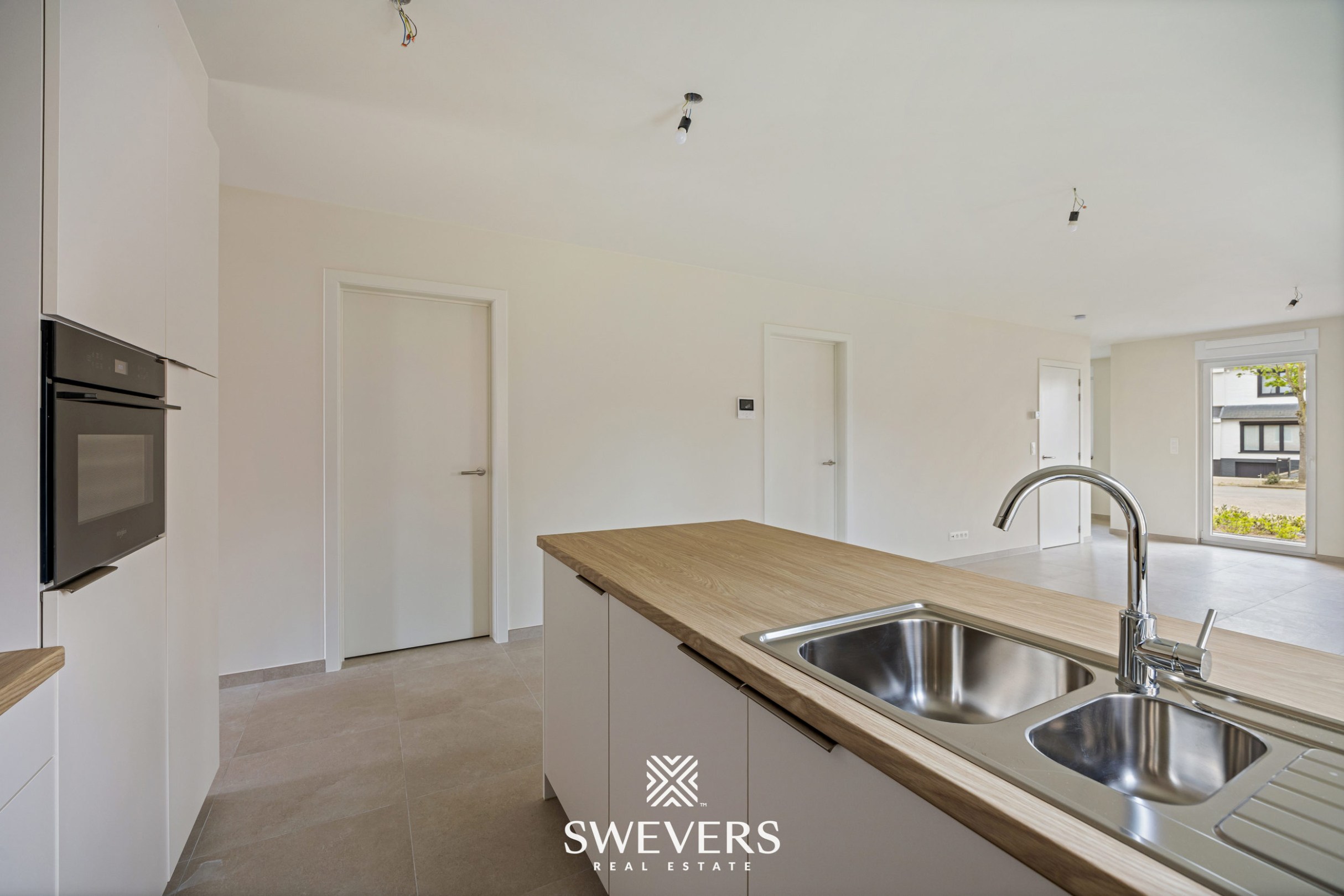 Modern gelijkvloers appartement met privétuin en dubbele parking - foto 5