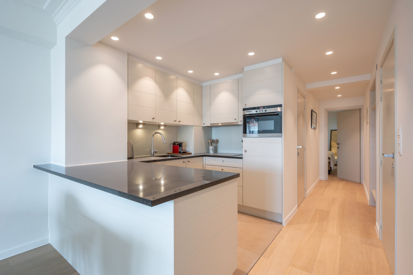 Lichtrijk 1 slaapkamerappartement in hartje Zoute met open zicht - foto 5