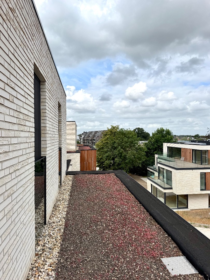 Dak-appartement met 2 slaapkamers, terras, autostaanplaats en berging - foto 5