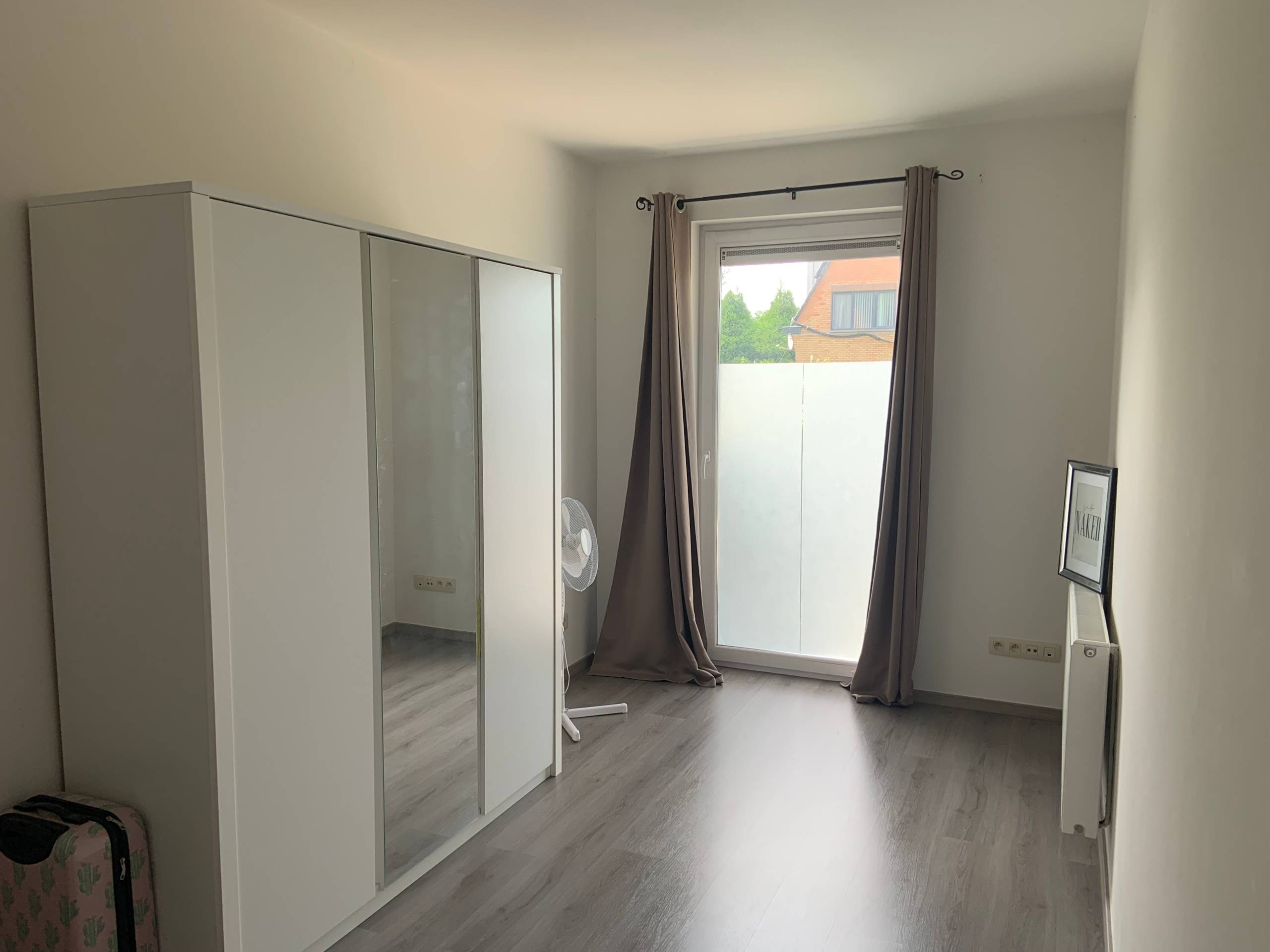 Gelijkvloers tweeslaapkamer-appartement te Wondelgem. - foto 4