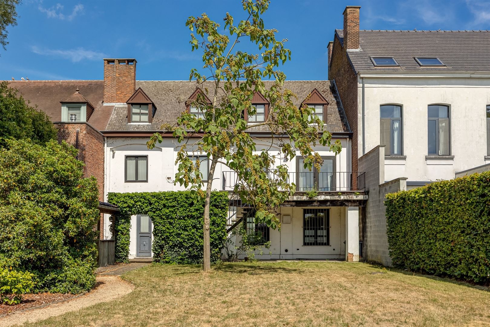 Grote woning in de dorpskern, met tuin en achter-uitweg. 'Must-see'! - foto 3