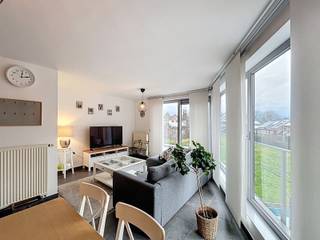 Bekijk het 360° virtuele bezoek op www.living-stone.beHet appartement met twee slaapkamers in het hart van Dilbeek, op de 2e en 3e verdieping (geen...