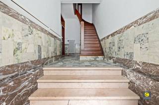 Te renoveren 3-slaapkamerappartement met terras in de populaire TentoonstellingswijkOntdek dit uitzonderlijk ruime appartement van maar liefst ca...